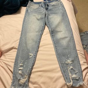 Skinny jeans with rips and white specks. From local boutique! Size 27